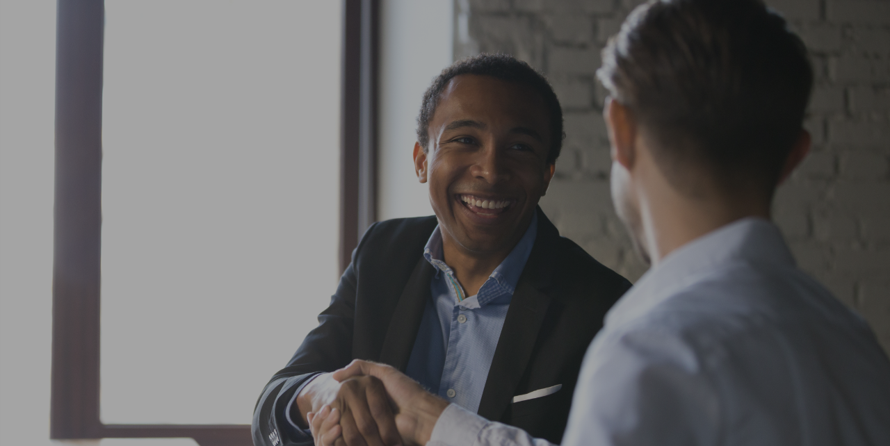 REALTOR&reg; meeting with clients